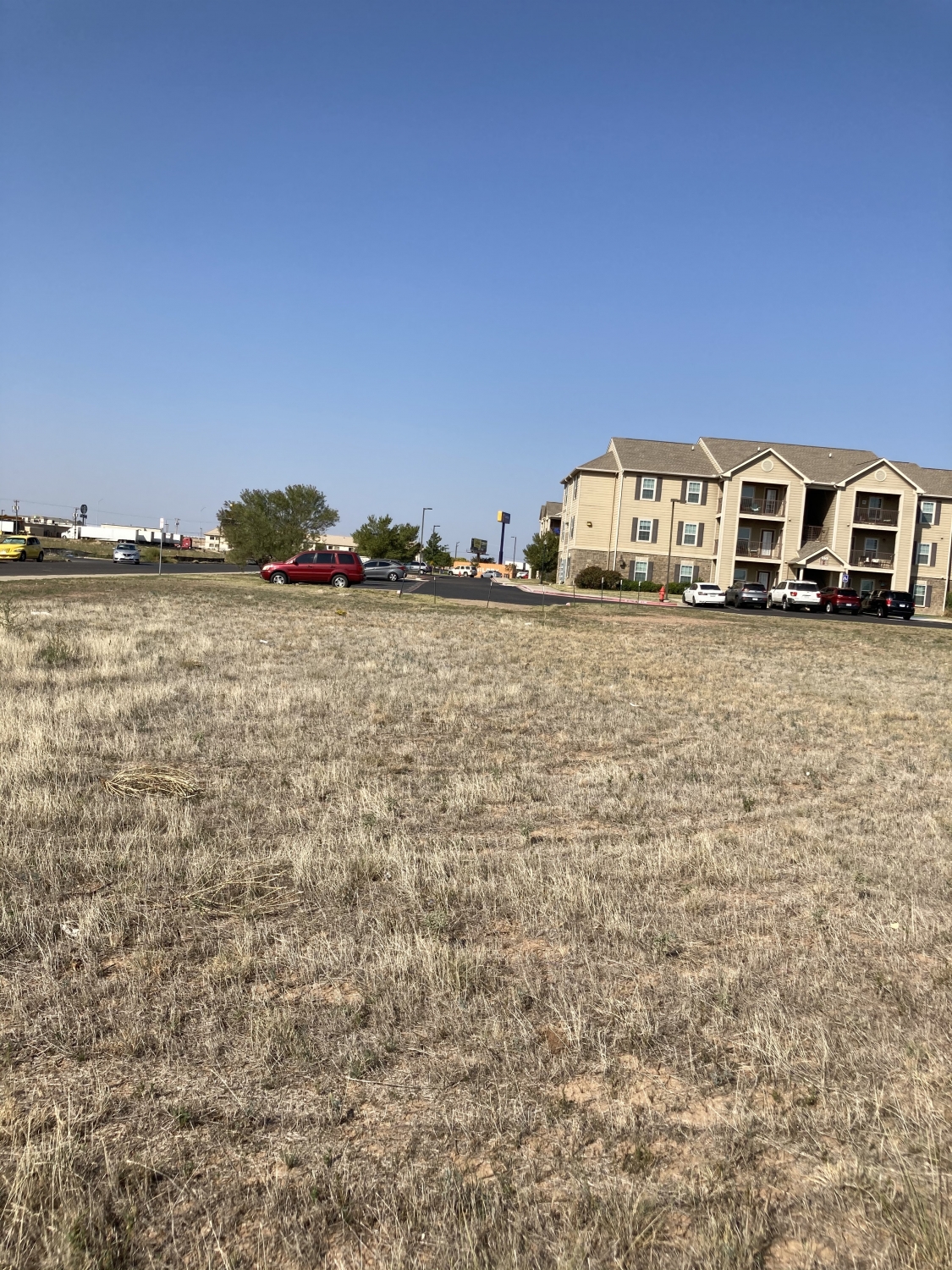 3 acres of land with apartment corner in the back
