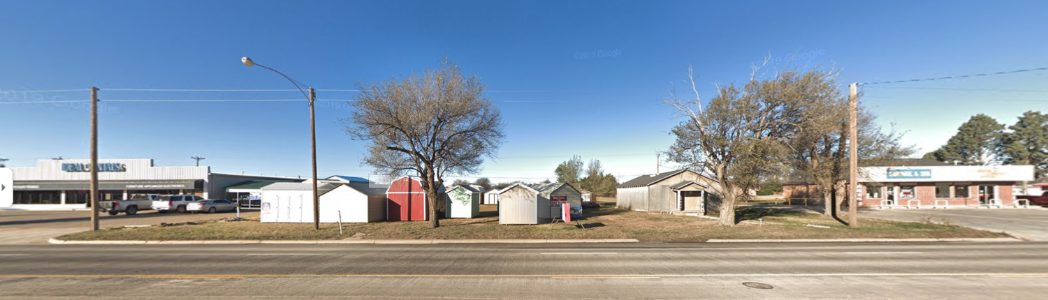 picture of lot with small whit storage units on it